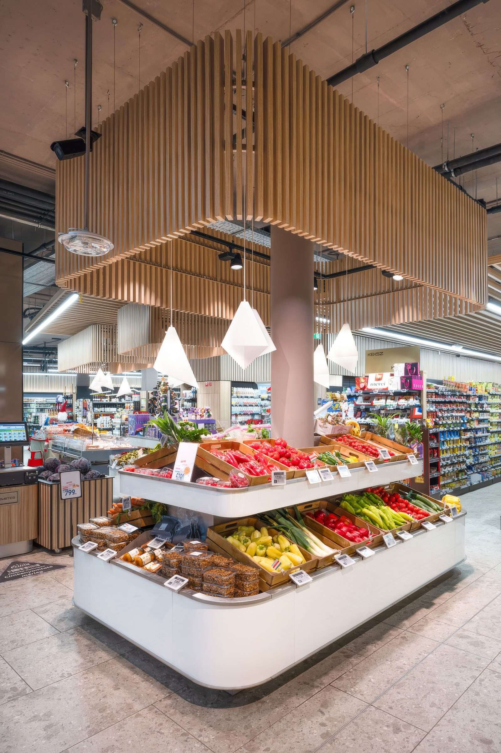 Modern supermarket produce section with wooden ceiling design.