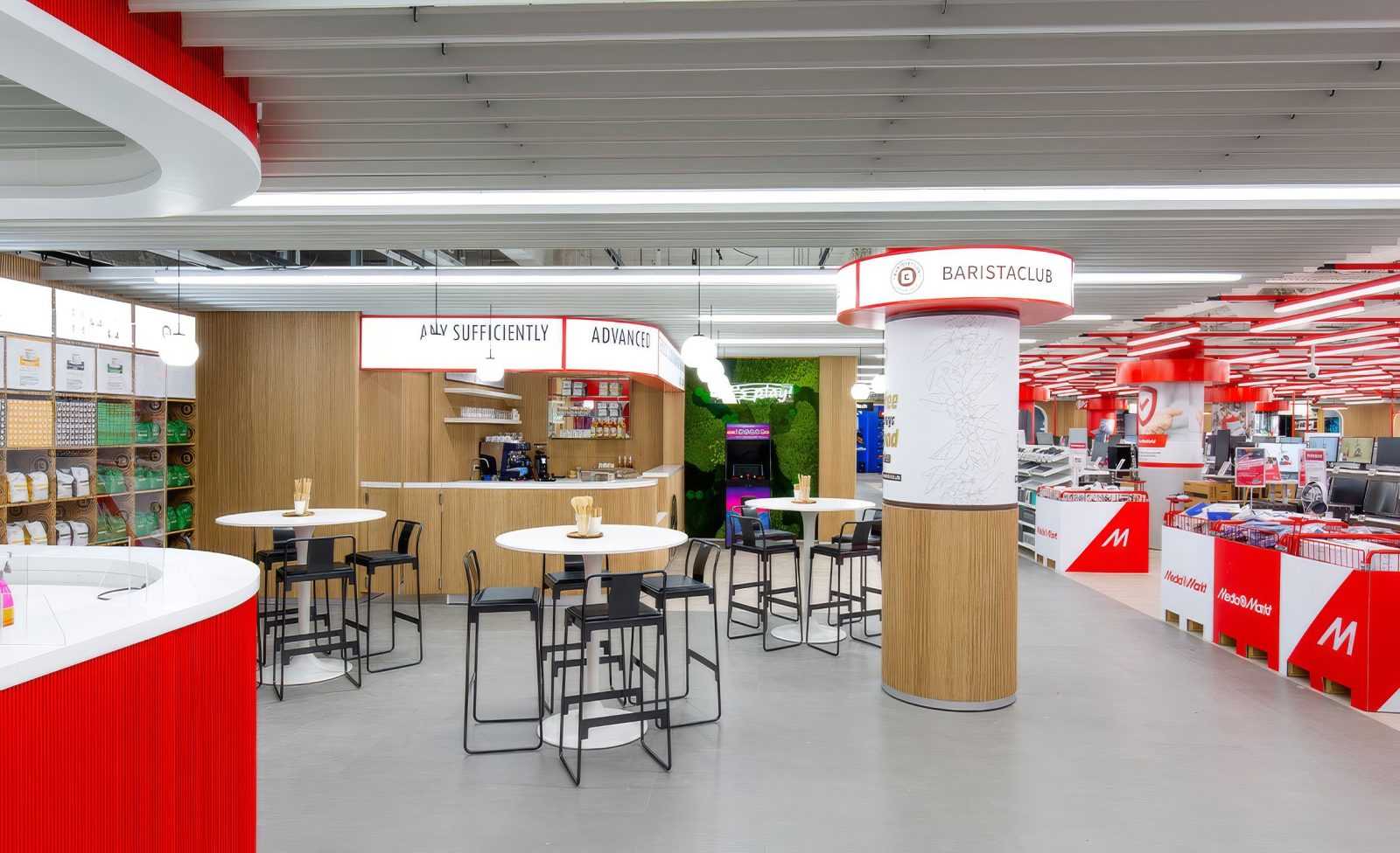 Modern Megaholz store interior with BaristaClub and red wooden design.