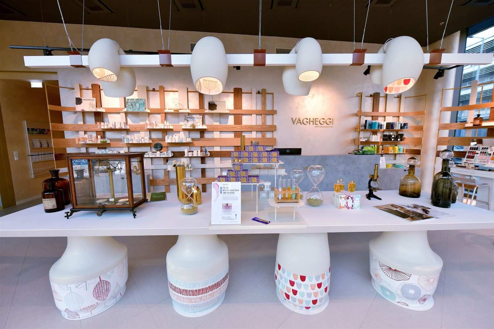 Vagheggi PhytoCosmetic store interior with wooden shelves and modern lighting.