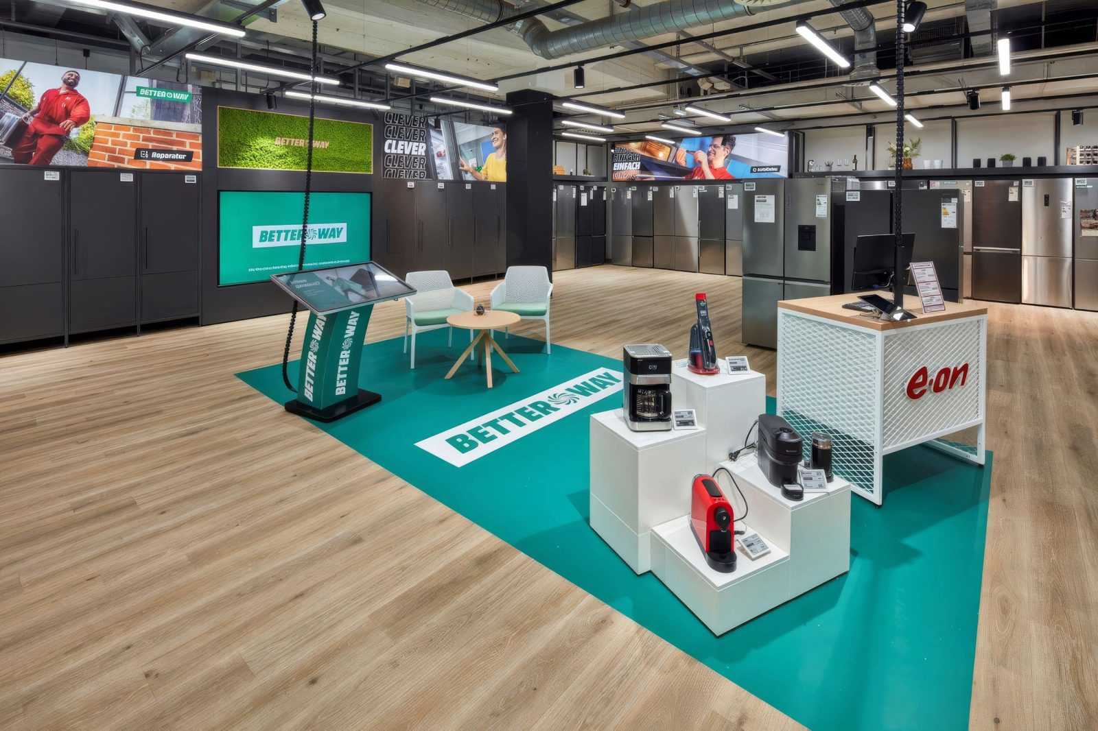Megaholz store interior with Better Way branding and home appliances.